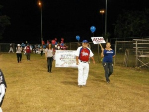 Carlos M. Iglesias, the proud representative of Jocaan, marching in the inauguration game.